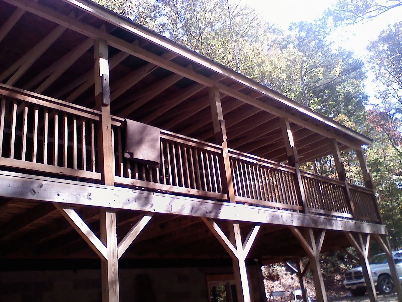 Timber framing under a new elevated porch and deck — Roof Leak Repair in Centennial by Roofing Brothers